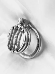 The Racket, a compact stainless steel chastity cage with short parallel bars