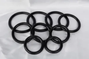 The nine black plastic sizing rings from the Mature Metal sizing kit